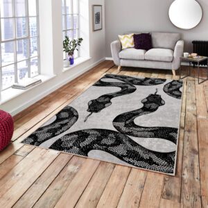 Black White Snake rug in front of a sofa, featuring a stylish black and white snake design