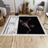Travis Scott Utopia album song list rug on a living room , featuring track titles from the album