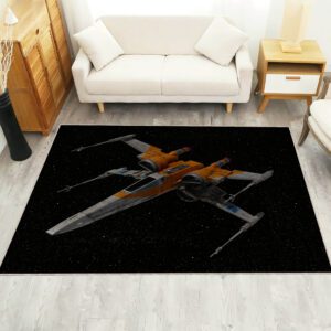 X-Wing Starfighter rug in front of a sofa, featuring the detailed Star Wars spacecraft design