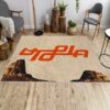 Travis Scott Utopia album cover rug in front of a sofa, featuring the album artwork design