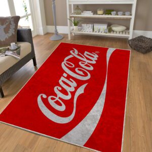 CocaCola rug on the floor in a cozy living room setting