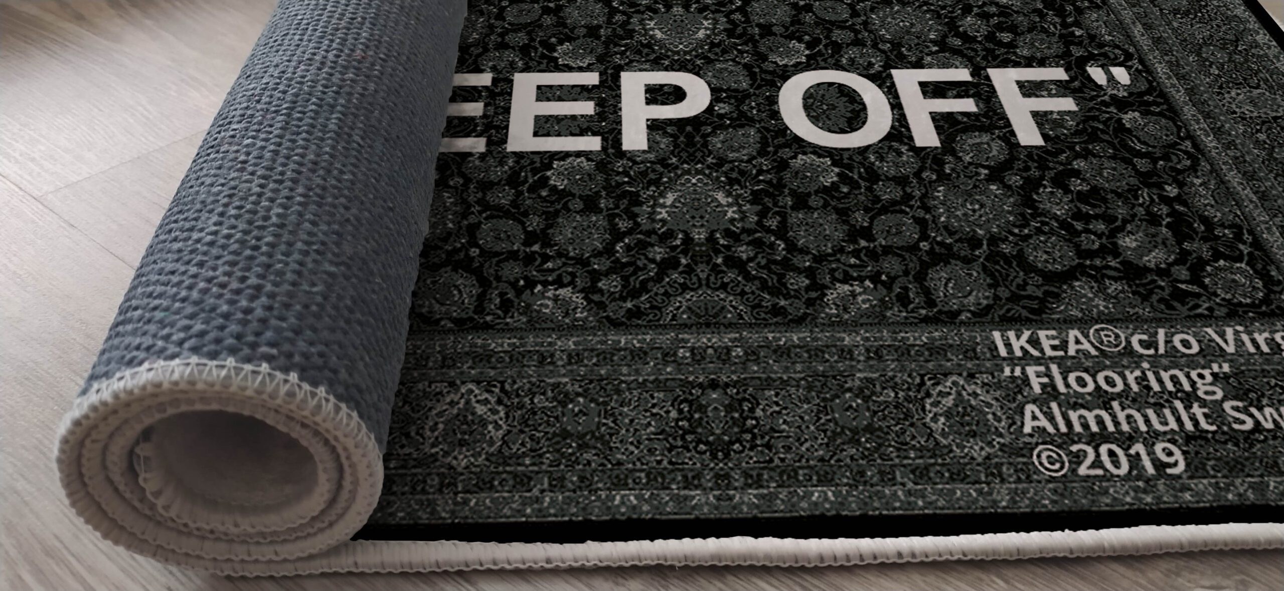 Keep Off rug on the floor in a modern living room