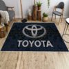 Toyota logo area rug on the floor in a modern living room