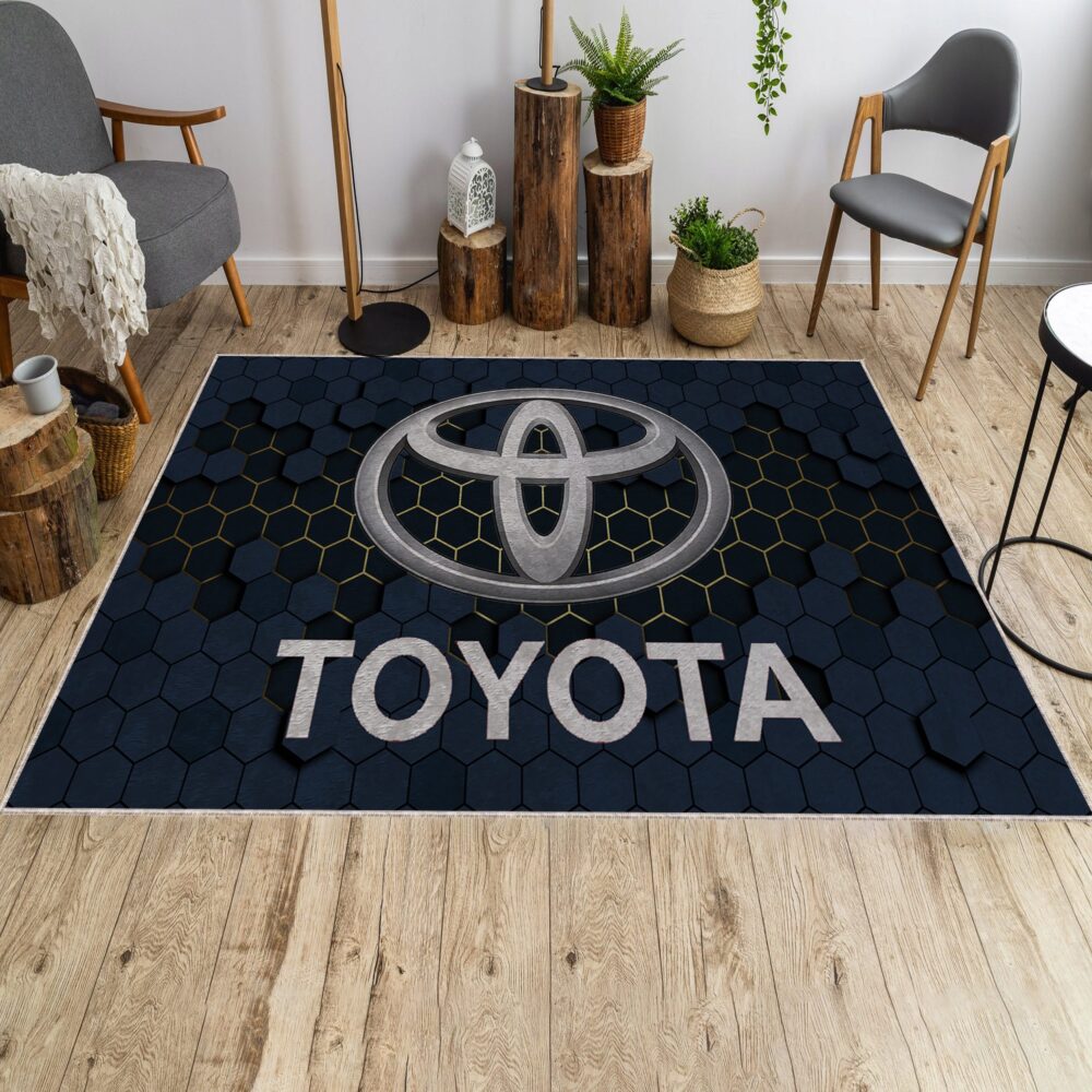 Toyota logo area rug on the floor in a modern living room